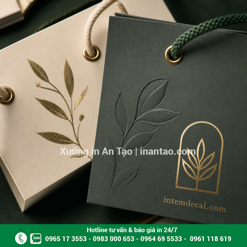 Gia công túi giấy cao cấp ép kim dập nổi Chi tiết ép kim dập nổi và quai dây trên túi giấy cao cấp